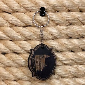 The product image shows a laser cut dark key chain with the Old Town Hall and the text Rauma below it.