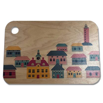 The picture shows a cutting board with illustrations of the buildings of the Old Rauma and the lighthouse of Kylmäpihlaja.